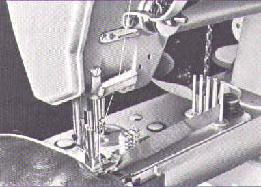 Cylinder arm machine with binder